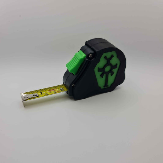 Necron tape measure extended showing dual scale markings - Warhammer 40K 10 foot measuring tool