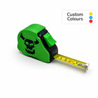 Green Tide tape measure extended showing dual scale - tabletop wargaming 10ft measuring tool with battle emblem