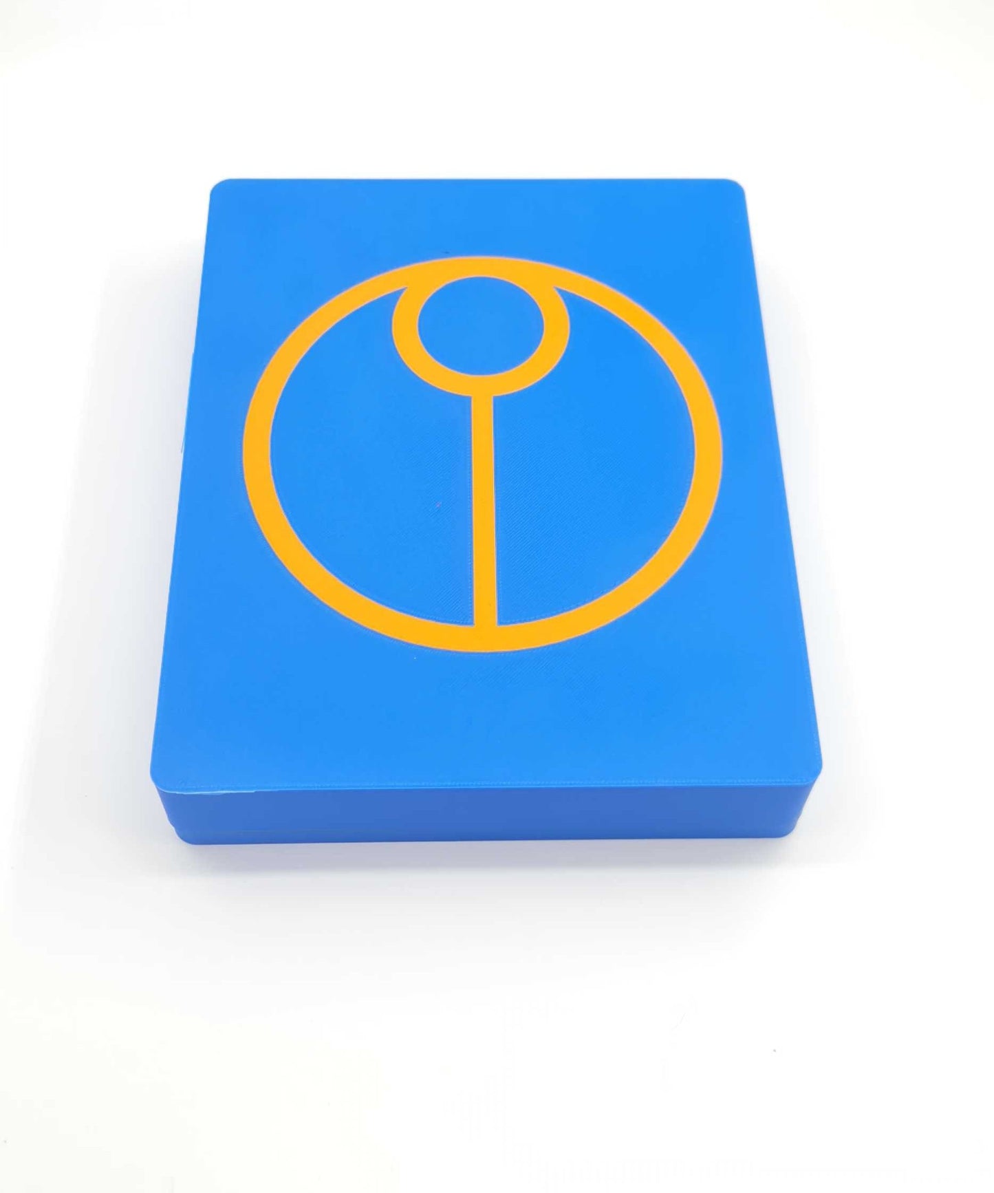 Blue square block with yellow circular symbol on a white background