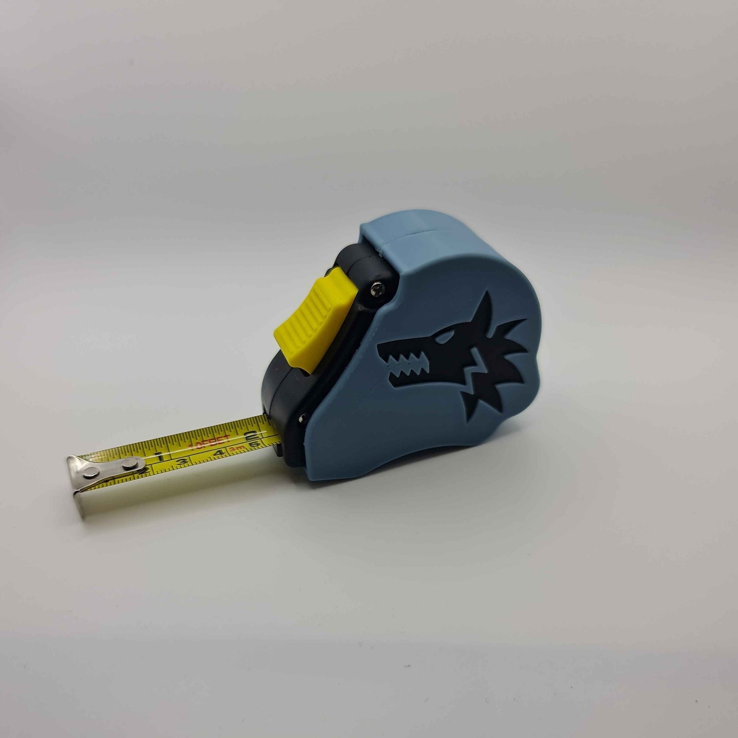 Space wolves - Frost wolves tape measure extended showing dual scale - Warhammer 40K 10ft measuring tool with chapter emblem