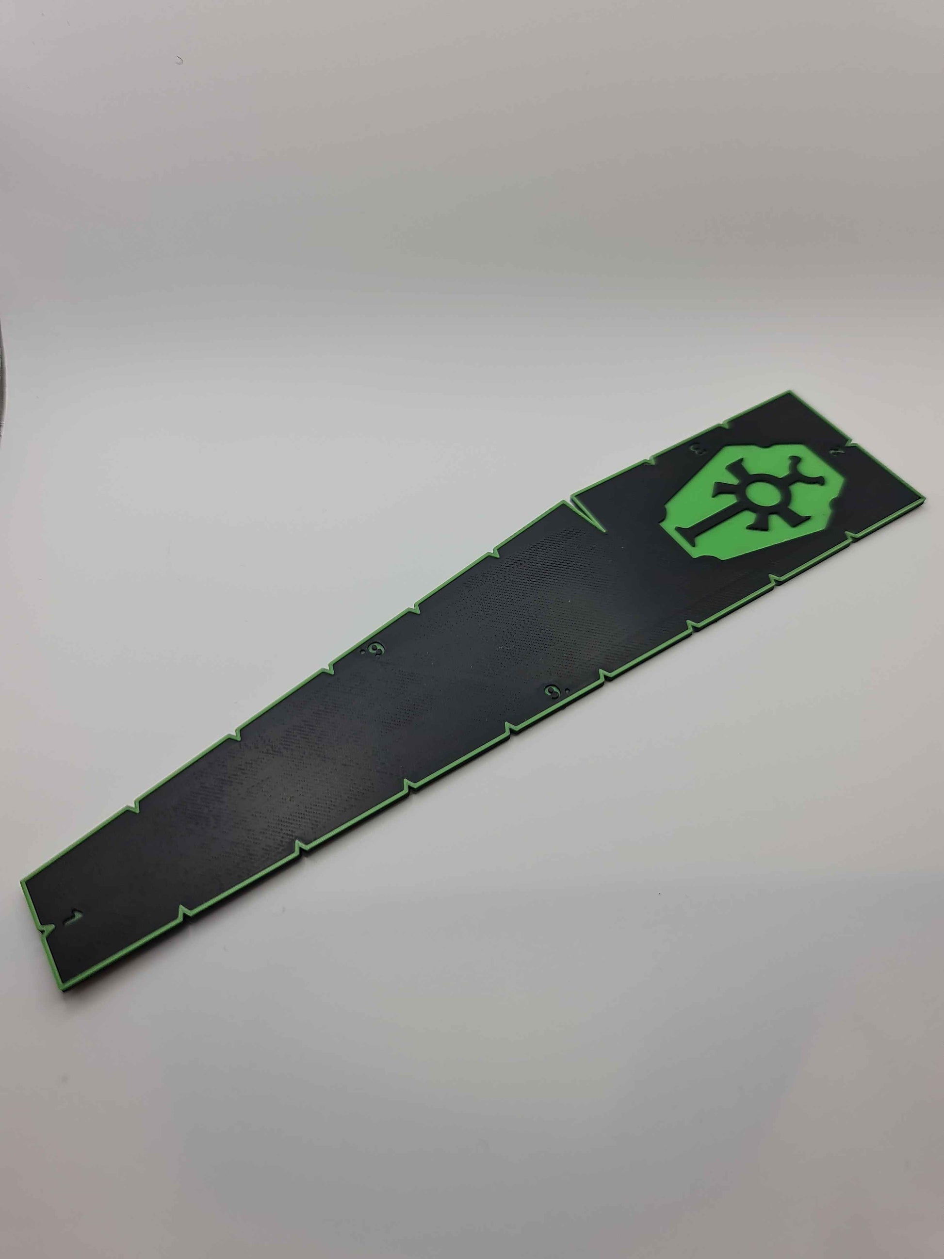 Necron Tomb Dynasty measurement tool displaying game ranges - Warhammer 40K 9 6 3 2 1 inch ruler with dynasty emblem