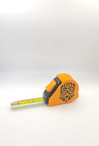 Space Dwarves tape measure extended showing dual scale markings - tabletop wargaming 10 foot measuring