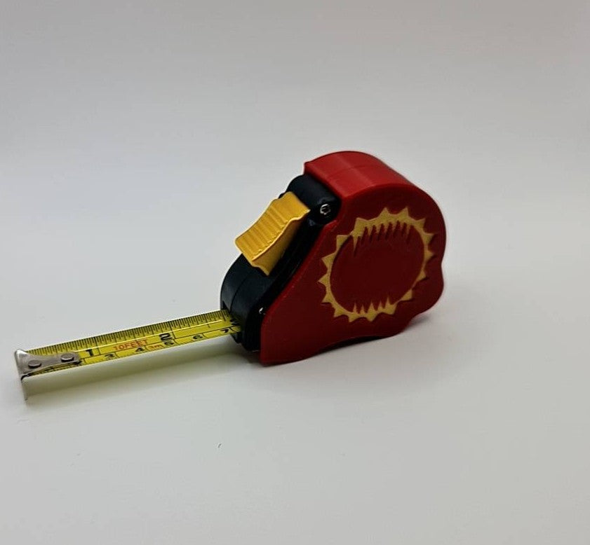 World Eaters berserker tape measure extended showing dual scale - Warhammer 40K 10ft measuring tool with gold reaver emblem